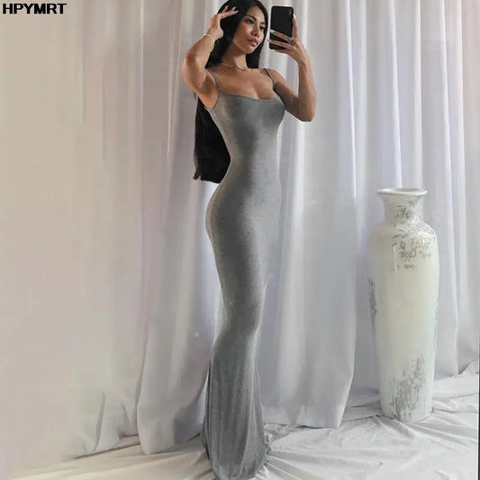 Sleeveless, tight, and sexy long satin dress